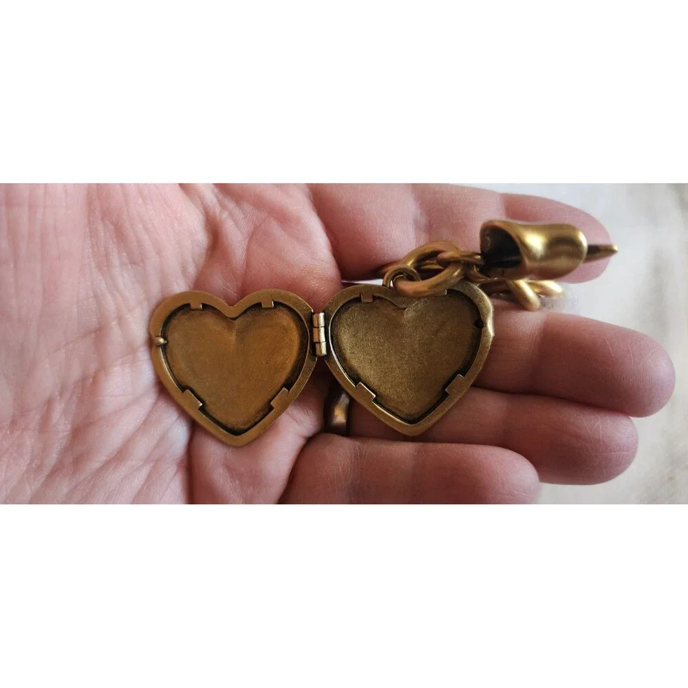 Coach CZ276 Bow Heart Locket Bag Charm-Brass/Ruby